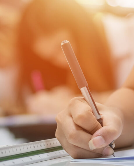 Image of a student's hand writing